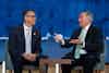 two men in suits talking
