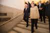 a group of people walking up stairs